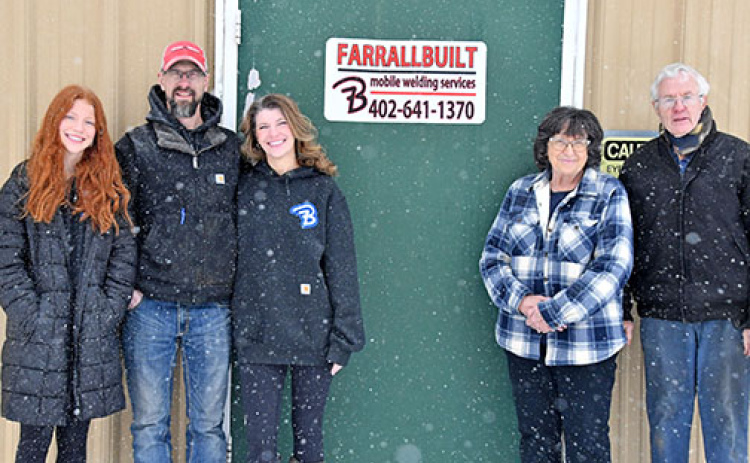 Chad Farrall (center left) will be relocating his business, Farrallbuilt, to Hatfield Street where Lindquist Welding previously operated. Farrallbuilt is expected to be fully moved to its new location in early March. Pictured  from left are: Farrall’s daughter Ellie Brown, his wife Becky, and Kay and Jim Lindquist.