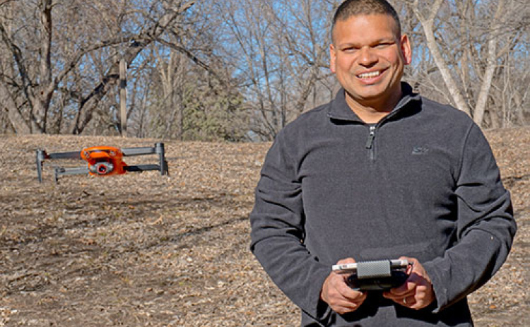 Ravi Singh demonstrates using one of two drones he and his wife, Gina, utilize with their new business, Innovative Drone Solutions.