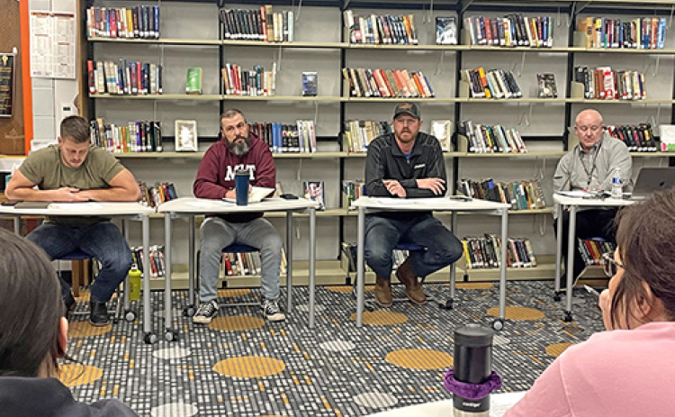 Members of the Giltner School Board hosted a public information meeting Wednesday night to inform parents and faculty about the plans for a basketball coop between Giltner and Harvard high schools. Pictured from left are board vice president Logan Rath, board member Brandon Hunnicutt, board president Brad Schutt and principal Kurt Finkey.
