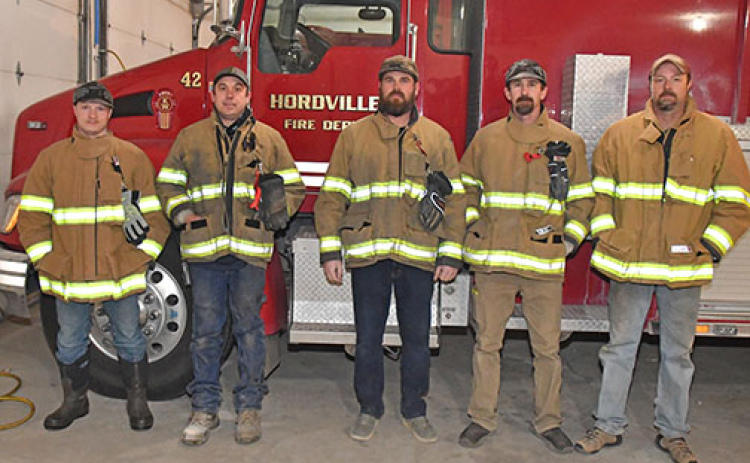 A few of the 18 members of the Hordville Volunteer Fire Department.