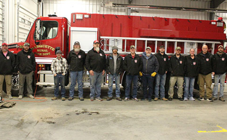 Some of the 20 members of the Marquette Fire & Rescue squad.