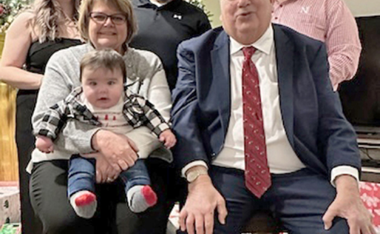 Bill Peard (front right) continues to live in Waukee with his family. Featured in the photo along with Peard includes, front from left: wife Linda and grandson Mason. Back row: Daughter-in-law Annetta Peard, sons Tanner and Brady.