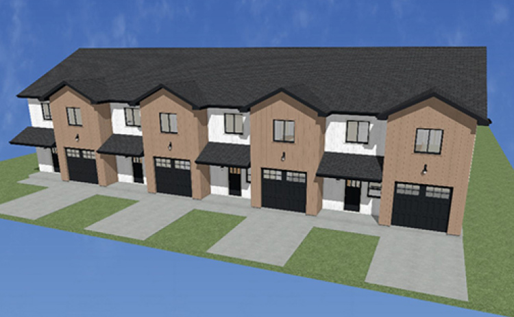 Shown here is a graphic illustration of the four town homes Casey Nunnenkamp will be building on 12th Street. He noted that the units appear to be built as one structure, but in fact have two-hour firewall separation, which means they are each considered their own structure.
