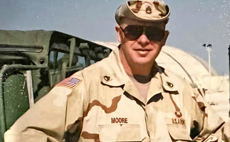 Staff Sergeant Kent Moore served 23 years in the U.S. Army and now works as a government contractor at Fort Campbell, Ky., repairing military and commercial equipment in support of the base.