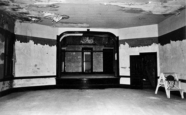 This photo of the upper floor of the Hampton Opera House looks east toward the stage of the building’s hall where many events took place. The picture was included in the documentation for the building’s inclusion in the National Register of Historic Places in 1988.