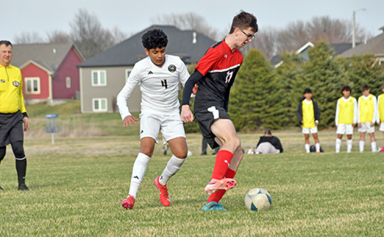 Aurora senior Thomas Brandl, shown here defending against a Northwest player April 1, scored twice for the Huskies in a 5-1 win at Lakeview Thursday.