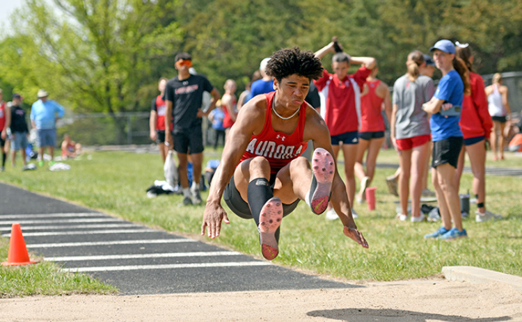 Aurora’s Vendell Juzyk won both the long and triple jumps for the Huskies during the Central Conference meet in York.