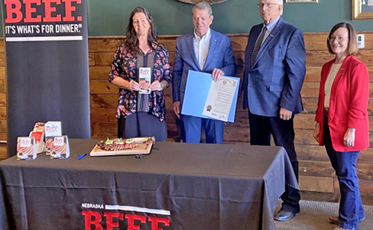 Gov. Jim Pillen (second from left) holds a proclamation naming May as ‘Beef Month’ in Nebraska. He was joined at the proclamation signing ceremony at the Single Barrel restaurant in Lincoln by (from left) Nebraska Beef Council board chairwoman Rosemary Anderson, Nebraska Cattlemen president Dick Pierce and Nebraska Department of Agriculture Director Sherry Vinton.