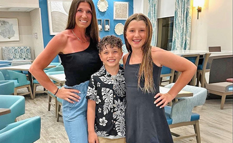 When she isn’t working remotely from her home in North Platte, Sarah (Shirley) Smidt travels to her office/branch in Jersey Village, Texas near Houston, sometimes accompanied by her two children, Nash and Nova.