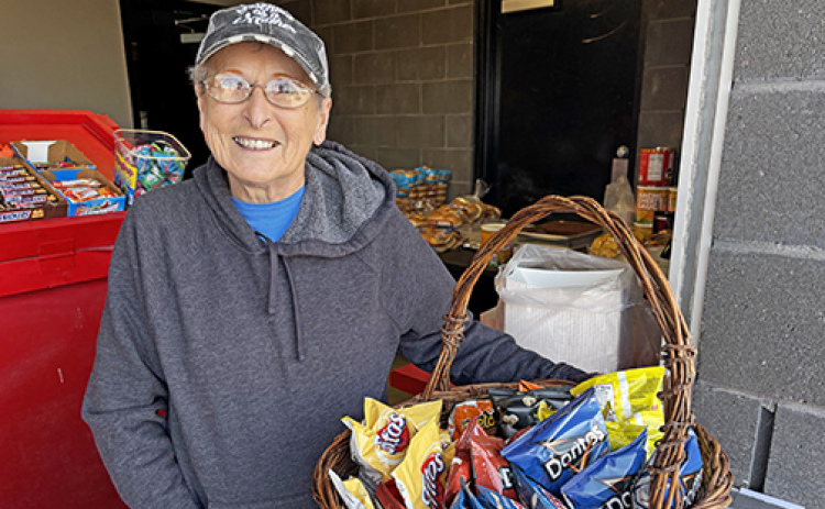 Pictured is Sandi VanWormer in the concession stand during the Swingin’ for Sandi softball tournament in April. VanWormer was diagnosed with breast cancer last year and has been a recipient of cancer fund donations. The tournament was the latest event held to support the cancer fund.