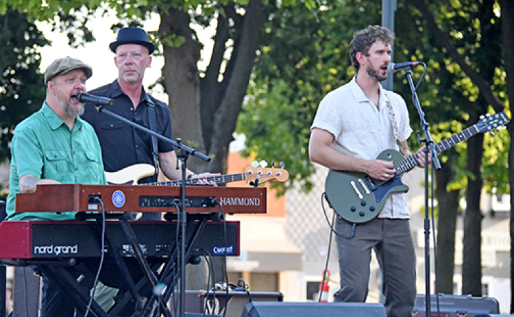 Josh Hoyer & Soul Colossal gave the final performance of the season at Bands on the Bricks on Friday. From left are Hoyer, bass player Mike Keeling and on guitar, Aurora grad Myles Jasnowski.