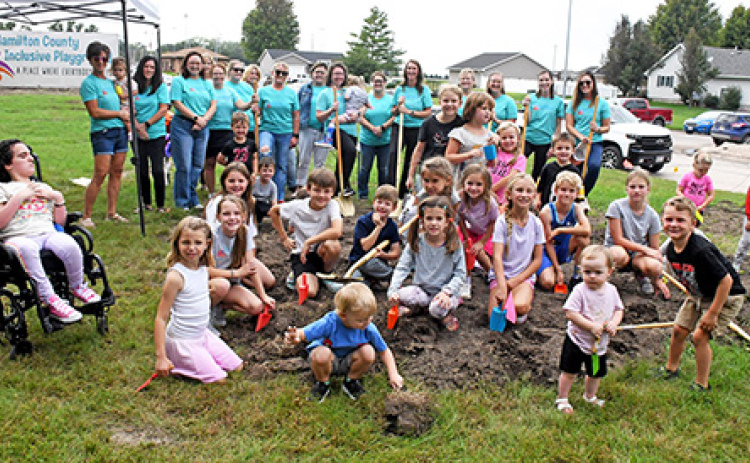 Playground committee members and local children participated in the groundbreaking ceremony for the new $1.7 million Hamilton County Inclusive Playground last Wednesday, Sept. 24. The children were provided with plastic shovels which they put to use both before and after the formal groundbreaking.