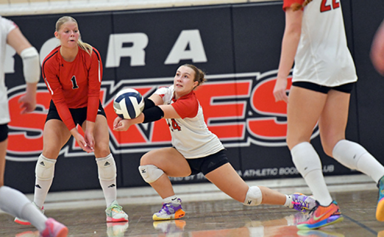 Aurora’s Paityn Wyatt receives a York serve during the Huskies’ five-set victory over the Dukes Thursday. Wyatt tallied 14 digs in the win for the Huskies.