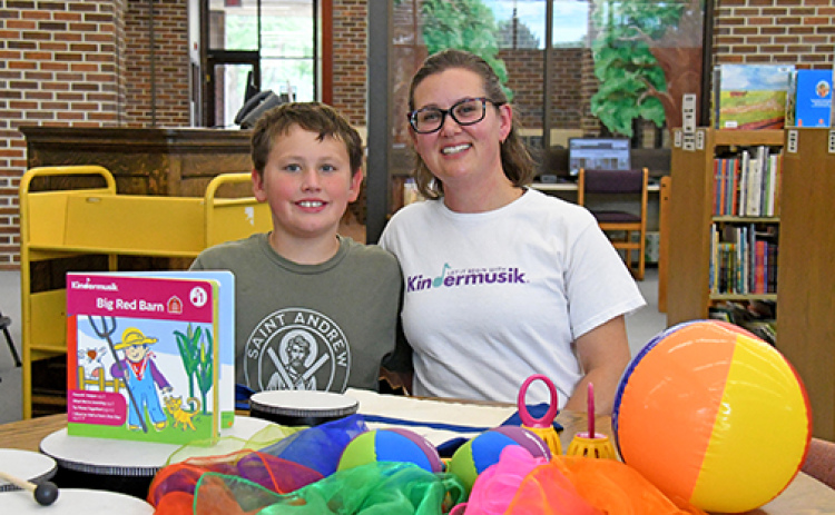 Alexis Linehan will be hosting Kindermusik classes at the Bremer Center through her business, Apples and Oranges: Music Studio & Therapy. Kindermusik is an educational program that promotes children’s physical, cognitive and emotional developmental skills through music. Pictured with Linehan is her son, Lucas, who took Kindermusik with his mom 10 years ago in Omaha.