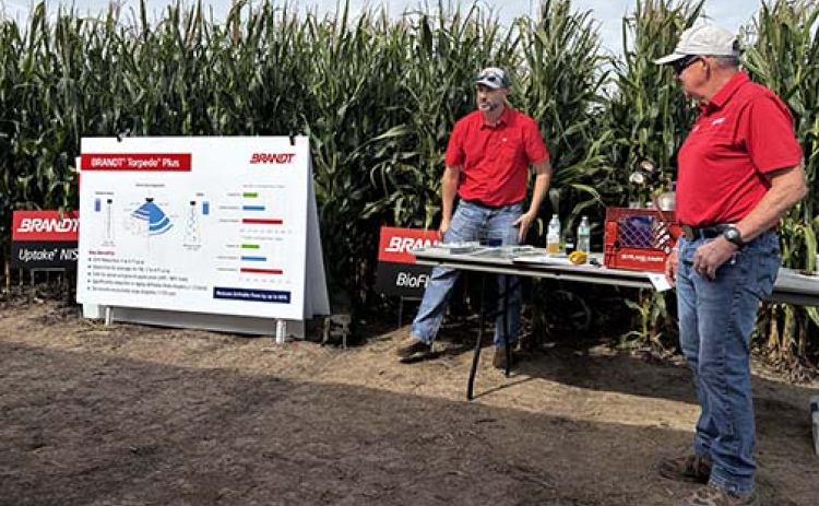 BRANDT staff members gave demonstrations in a local cornfield of products manufactured at the new Specialty Ag Formulations facility in Aurora during a Nebraska Agronomy Day Aug. 27.