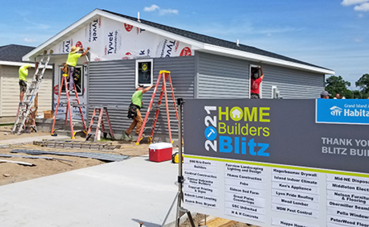 The contractors who will be constructing a Habitat for Humanity home in Aurora next summer have plenty of experience in building a house in just one week. Above is a blitz build completed in 2021.