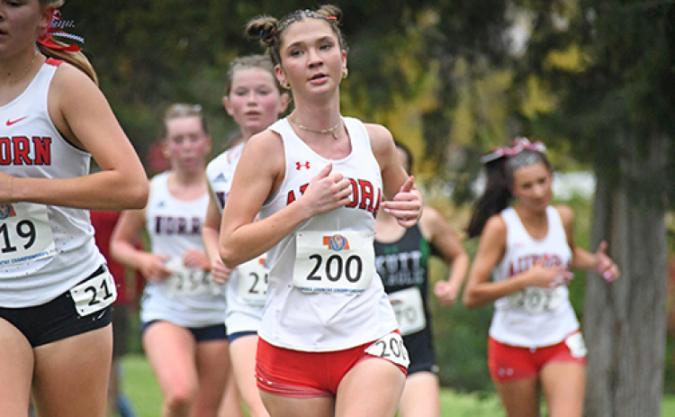 For the last time, Aurora’s Ella Eggleston competed at the state cross country championships while finishing 43rd at 20:48, the best time she’s ever ran in the event.