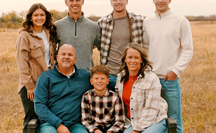 Hampton grad Brad Jacobsen (front left) is an associate superintendent of civic engagement for Lincoln Public Schools and previously worked as the principal of Ashland-Greendwood for 16 years. Pictured above is Jacobsen’s family, front from left: son Tate, wife Staci. Back row: Tyler’s fiance Makenna, sons Tyler, Dane and Cale.