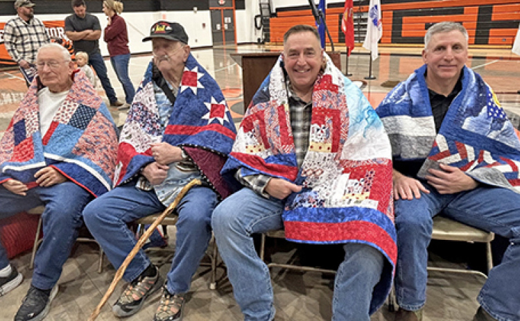 These veterans were each honored with a quilt of valor during Giltner Public Schools’ Veterans Day program on Tuesday, Nov. 11. Pictured from left are Robert "Jody" LaBrie, Thomas Lambert, Chris Most and Daniel Most.
