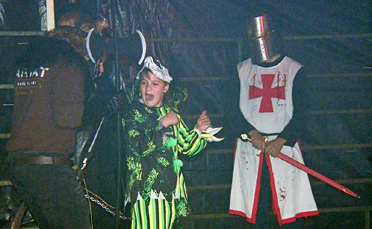 Startling an attendee was a woodland cultist, played by Isaac Graham (left) and a bloody crusader (Christian Alvarez).