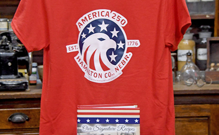 The Hamilton County, Nebraska Celebrate America 250 Committee started selling its newly published “Our Signature Recipes” cookbook during the Thanksgiving weekend. The books are on sale at the Plainsman Museum. Also available for purchase are America 250-themed t-shirts, bistro cups, stadium cups, stickers and magnets.