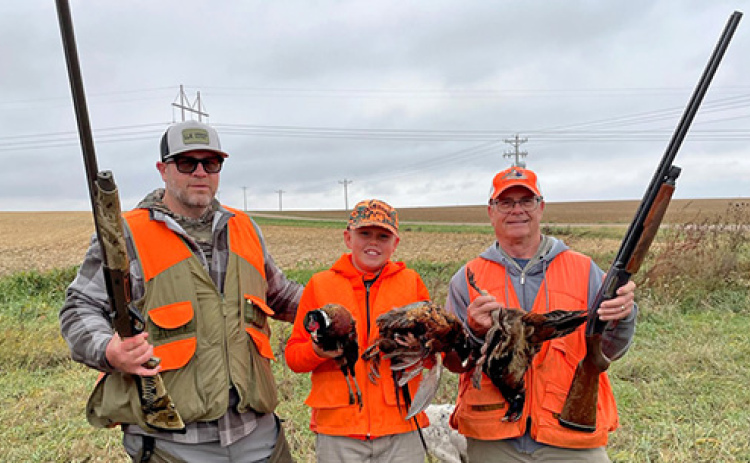 When Glenn Obermeier (right) bagged this year’s pheasant for the Upland Slam, he was hunting  with his son-in-law and grandson, Ross and Graydon Golden from Florida. Many out-of-state hunters have completed the Upland Slam since its inception in 2018.