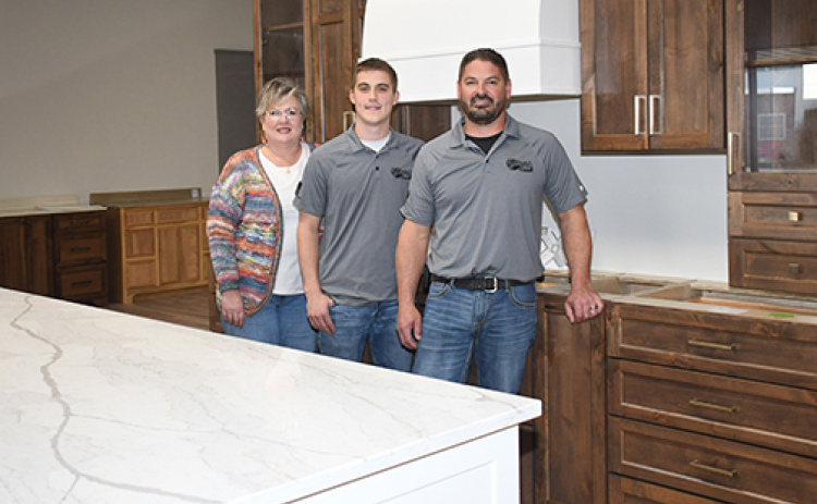 Pictured from left in Danish Oak’s new showroom are Shauna Pursley, Drake Schafer and Dane Schafer. The Hampton business celebrated its 20th anniversary last year and recently expanded next door into the former Smith True Value Hardware Store.