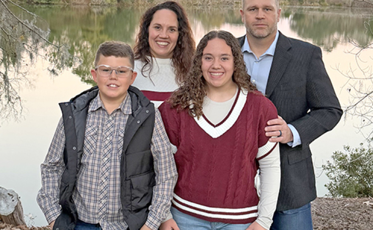 Rebecca (Obermeier) Golden is the director of resource development for Florida Gateway College’s nonprofit foundation which helps students receive the financial support and resources they need to succeed. She is pictured with her husband, Ross, her son, Graydon and daughter, Raylen.
