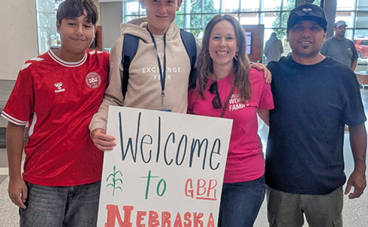 The Diaz family of Aurora greets Danish exchange student Ludvig Bjerring (second from left) as he arrives in Nebraska for his exchange year. From left are Adrik Diaz, Bjerring and Sara and Dario Diaz.