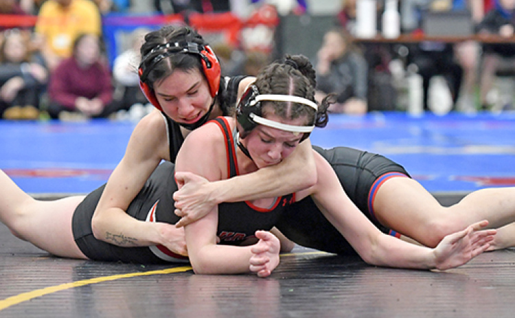 High Plains senior Dakota Gress became the first girls wrestler from the ANR coverage area to hit the 100 career win milestone Thursday during the Norm Manstedt Invite in Columbus. Gress is shown here battling Aurora’s Mia Leininger.