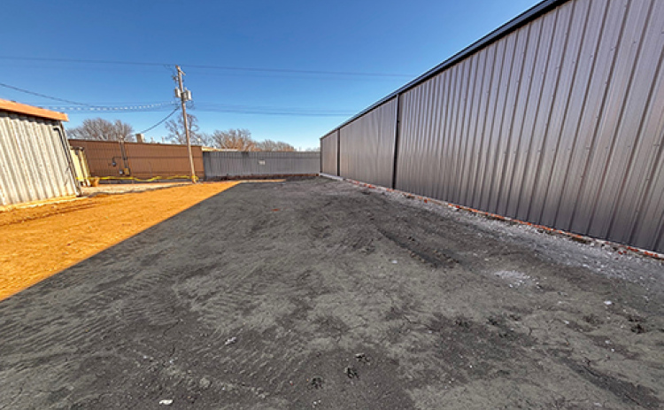 The City of Aurora has filed a notice of special assessment and lien for $323,805 against this lot, the former site of the Gambles building. The property is owned by Stan Valasek.