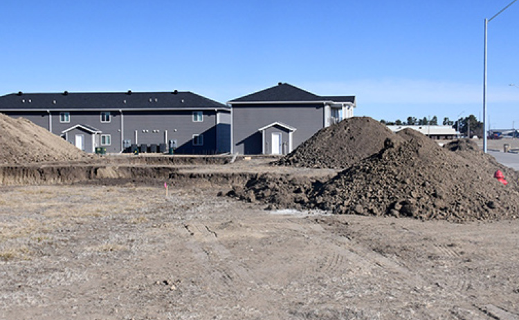 Holes in the ground reflect new single-family dwellings soon to be built along Highlander Lane in the new Streeter Subdivision.