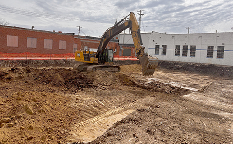 An excavation crew began moving dirt on the north side of the downtown Roe Chevrolet dealership this week, where a service department expansion project is being planned.