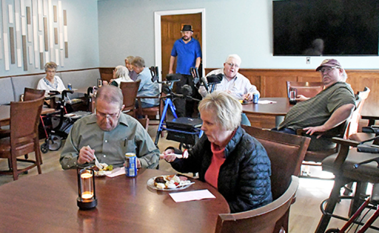 East Park Villa hosted its grand opening of the Grille Friday where residents and their guests could dine inside and enjoy music and arts brought together by East Park Villa’s employees. The Grille was constructed in EPV’s east dining room area.