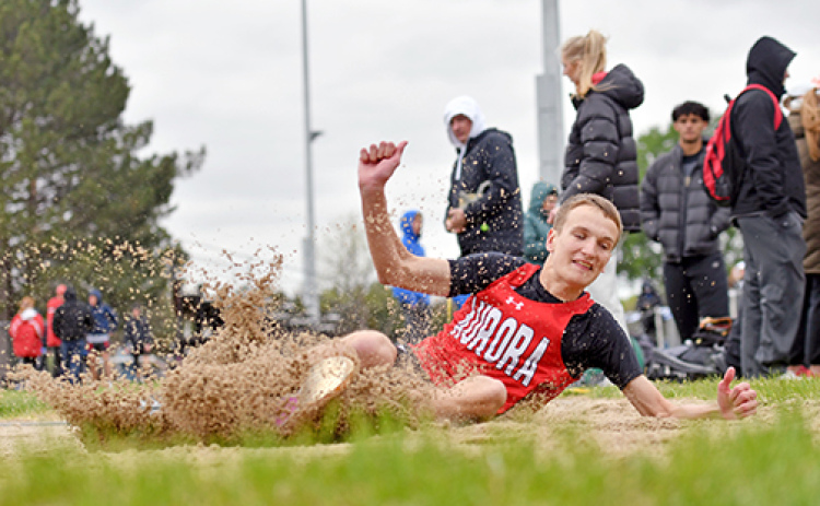 Jayden Slagle, pictured here during Monday’s CNTC competition, broke Aurora’s triple jump record at last week’s GINW Invite, leaping to a mark of 48-2.