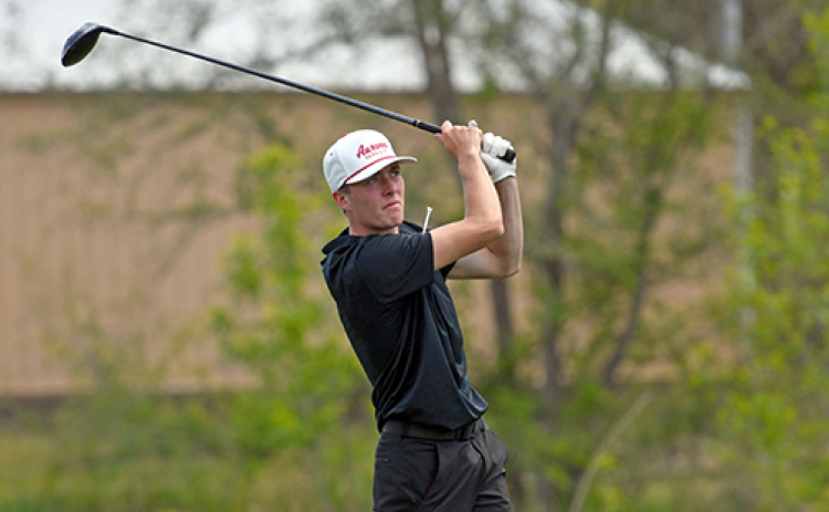 Ryan Staehr watches his tee shot from the opening hole at Schuyler Golf Club during Friday’s Central Conference round. Staehr finished with an 83, one stroke off the medal stand.