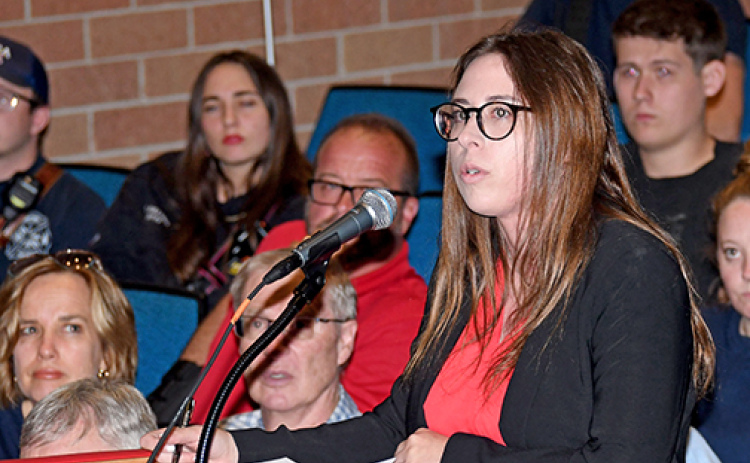 Amelia Guenther, local firefighters union president, was one of several asking questions during last week’s presentation by two private ambulance companies seeking a contract to provide services in Aurora and Hamilton County.