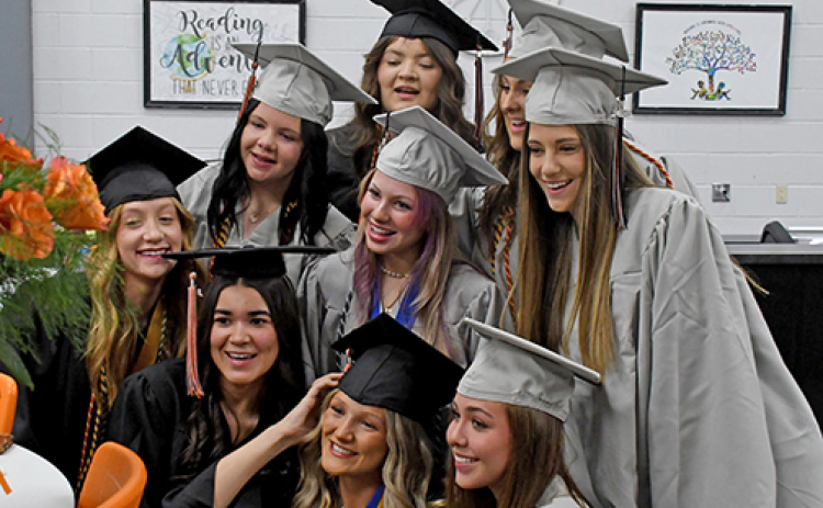 Giltner High School celebrated the graduation of the Class of 2026 Sunday afternoon with 19 graduates walking on stage to receive their diplomas. Prior to the ceremony, students from the class made a TikTok together lip syncing to “I’ll Always Remember You” from “Hannah Montana.” Pictured in front, from left: Harley Fesuluai, Gracie Kreutz, Alice Puhl. Second row: Avery Reeson, Karly Eastman, Eliana Bish, Beatrice Donati. Back Row: Litzy Ledezma and Kailyn Wilson.