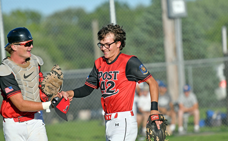 Aurora pitcher Lukas Fry was all smiles and a bit relieved coming off the mound early against Gering Thursday after snagging a hit right back up the middle that nearly got him in the face.