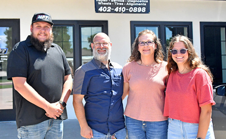 Pictured above from left are the new owners of MPT Auto Service, Tristen Evans and Colt Salmon. To Salmon’s right are his wife Jasmin and their daughter Zoe.