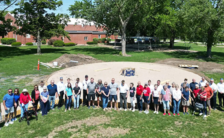Committee members and other supporters of the new Hampton Veterans Memorial Park gathered at the site on the grounds of the City Auditorium on Memorial Day to celebrate the beginning of construction on the monument. Organizers hope to have the major part of construction on the park completed by this fall.
