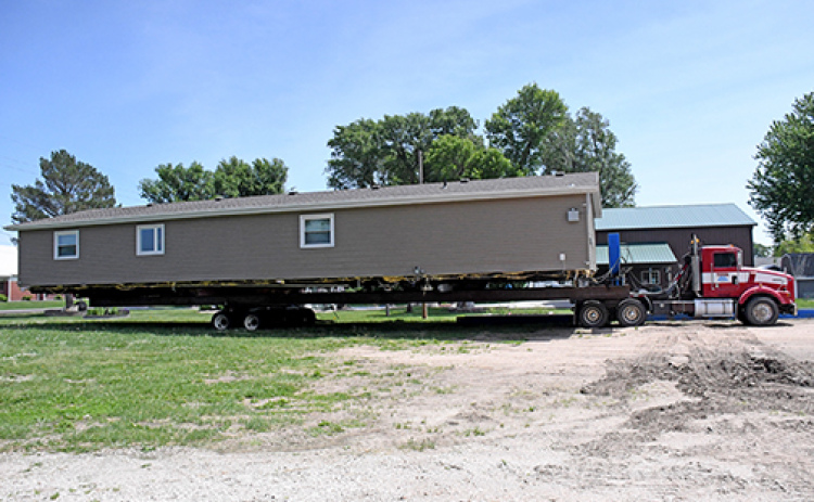 Little Stingers Childcare had its two modulars relocated to the lot south of Giltner Elementary School last week to expand its facilities in order to meet the growing needs for children and staff. Little Stingers will be hosting a womens nine-hole golf scramble on June 12 to raise money for the ongoing construction and facility needs.