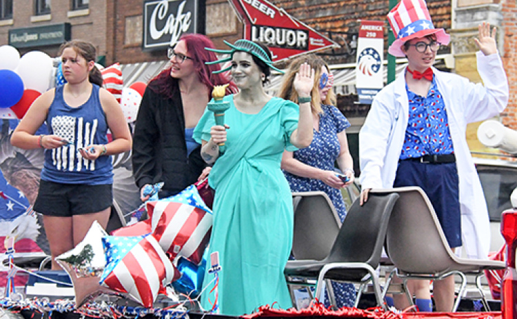 This year’s A’ROR’N Days parade featured patriotic floats. Representing Memorial Community Health on its float are from left: Kaiya Crabtree, Haidyn Scribner, Angelique Moore, Sam Sorensen and Colin Sorensen. See more A’ROR’N Days photos at auroranewsregister.com
