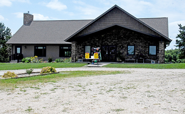 The original lodge building at CRC was replaced by this new one 12 years ago, which has given the facility more room for indoor activities on hot summer days. A rack with the campers’ lunch bags stands out front.