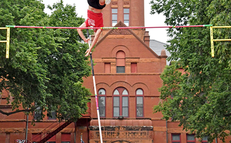 Class A state polevault champion Malakai Maly of Lincoln East won the high school division with a mark of 15 feet even.