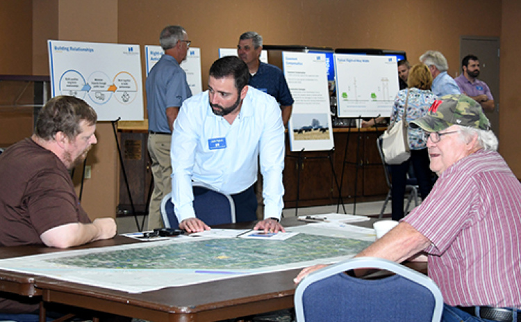 NPPD officials reviewed maps and gathered feedback Thursday in Aurora regarding a proposed transmission line project between Central City and Aurora.