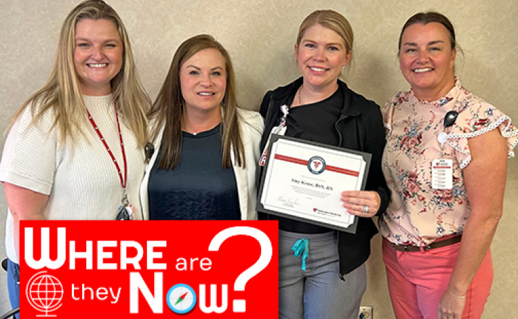 Aurora native Amy Kruse (holding certificate) was recently presented with the Image of Nursing Award at Nebraska Medicine.