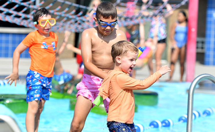 Swimmers cool off during one of summer’s hotter days at the Aurora Aquatic Facility. The pool, which closed for the season last week, saw a daily average of 259 swimmers throughout the 2026 season.
