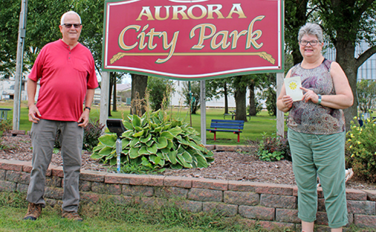 The first stop on Tom and Patti Kell’s trip in the fall of 2025 to visit towns named Aurora was Aurora, S.D., where they had this picture taken of them at the city park. South Dakota’s Aurora is near Brookings and close to the Minnesota border.
