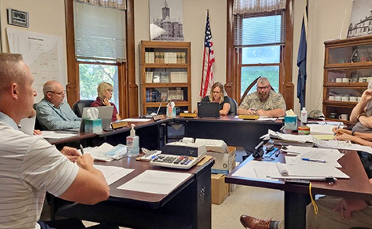 Aurora City Administrator Adam Darbro speaks to the Hamilton County Board of Commissioners on Monday to ask for an increase in the EMS subsidy for FY 2026-27.
